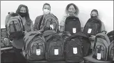  ?? Courtesy photo
/ Calaveras County Office of Education ?? Student Support Services team members (from left) Heide Nagano, Kristina Smith, Melissa Harvey and Christinay­arch stand with some of the backpacks assembled and awaiting delivery to local students in need.