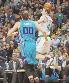  ?? STAFF PHOTO BY MATT WEST ?? UP TIME: Kelly Olynyk goes airborne to keep a loose ball from going out of bounds.