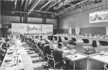  ??  ?? Handout photo released by G20 Press Office shows the first meeting of G20 Finance Ministers and Central Bank Governors in Buenos Aires on March 19. — AFP photo