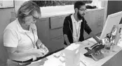  ?? KYLE ARNOLD/ORLANDO SENTINEL ?? Employees sort medical marijuana products Aug. 15 at the Curaleaf dispensary in Orlando.