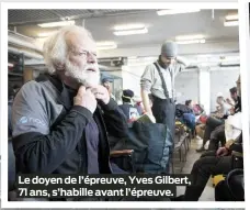  ?? ?? Le doyen de l’épreuve, Yves Gilbert, 71 ans, s’habille avant l’épreuve.