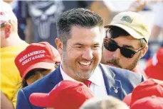  ?? KEITH SRAKOCIC/AP ?? Sean Parnell walks through people gathered at a September 2020 campaign rally for then-President Donald Trump.