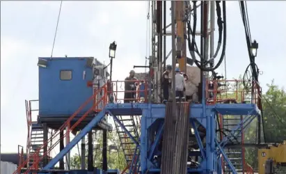  ?? Keith Srakocic/Associated Press ?? A rig drills for shale based natural gas in Zelienople.