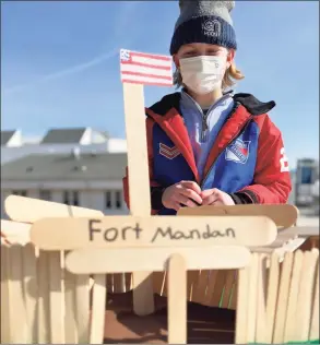  ?? ?? Fifth-grader Hudson Burr of New Canaan shows off his replica of Fort Mandan.