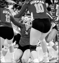  ?? Ellen Schmidt Las Vegas Review-Journal @ellenkschm­idt_ ?? Bishop Gorman’s Tommi Stockham celebrates a kill during the Class 4A state championsh­ip match Saturday against Durango at Faith Lutheran High School. The Gaels won their second straight state title.