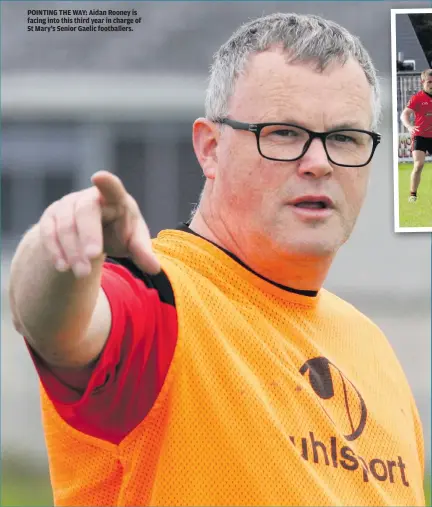  ??  ?? POINTING THE WAY: Aidan Rooney is facing into this third year in charge of St Mary’s Senior Gaelic footballer­s.