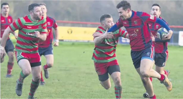  ??  ?? Rhys Hughes on a break for Llangefni against Pwllheli last Saturday afternoon.