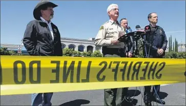  ?? Hayne Palmour IV San Diego Union-Tribune ?? SAN DIEGO Sheriff Bill Gore, center, addresses the media Saturday after the shooting at Chabad of Poway.