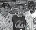  ?? MIKE STOKER ?? Cubs fan Mike Stoker, left, with his wife, Kristen, and Ernie Banks in 2011 at spring training in Arizona.