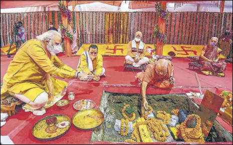  ??  ?? Prime Minister Narendra Modi, RSS chief Mohan Bhagwat and UP governor Anandiben Patel at the bhoomi pujan in Ayodhya on Wednesday.
PTI