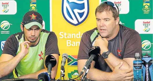  ?? Picture: RICHARD HUGGARD/GALLO IMAGES ?? UNDER PRESSURE: Zimbabwe’s captain Graeme Cremer, and coach Heath Streak, during a media conference on day two of the day-night test against South Africa at St George’s Park in Port Elizabeth