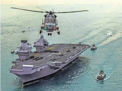  ?? PHOTOGRAPH: DAN ROSENBAUM ?? A Royal Navy Wildcat helicopter from RNAS Yeovilton flies above HMS Queen Elizabeth