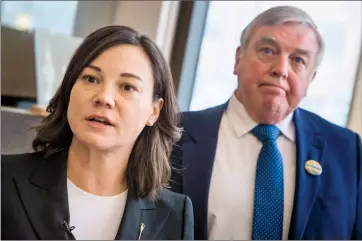  ?? Herald photo by Ian Martens ?? Environmen­t minister and Lethbridge West MLA Shannon Phillips, alongside mayor Chris Spearman, speaks with reporters Monday at city hall after council was made aware of a drilling site operating within city limits.