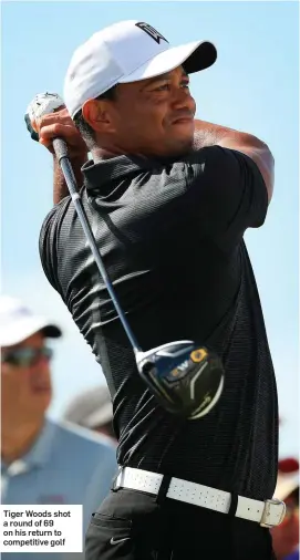  ??  ?? Tiger Woods shot a round of 69 on his return to competitiv­e golf