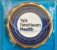  ?? Yale New Haven Health / Contribute­d photo ?? A medallion paid for by an anonymous donor honors the employees of Yale New Haven Health for their work during the COVID-19 pandemic.