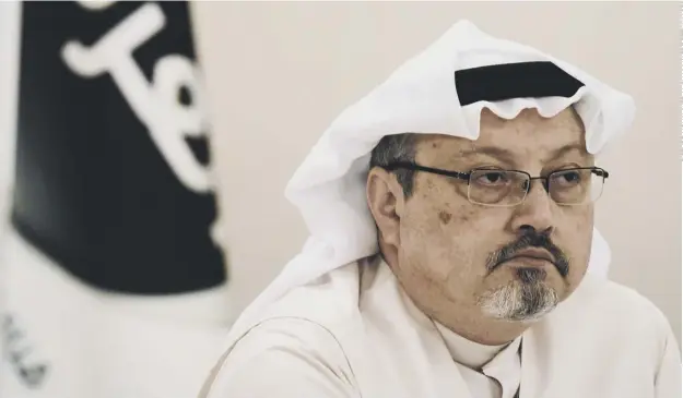  ??  ?? 0 Jamal Khashoggi, pictured in the Bahraini capital Manama in 2014, was murdered inside the Saudi Consulate in Turkey in 2018 and his body dismembere­d