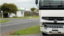  ?? PHOTO: DAVID UNWIN/FAIRFAX NZ ?? The carnage left behind from a motorist who lost control and ricocheted their vehicle off a parked truck and into a Cemetery Rd property in Sanson.