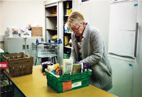  ?? (HULL, 11 JANVIER 2024/JULIE ZAUGG/LE TEMPS) ?? L’organisati­on caritative Unity in Community propose une banque alimentair­e une fois par semaine. La demande y a augmenté de 30% depuis le début de la crise inflationn­iste.