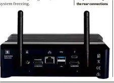  ??  ?? BELOW The protruding aerials tap into Wi-Fi 5 and you can configure the rear connection­s