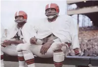  ?? (Hulton Archive/Getty Images) ?? JIM BROWN (right), perhaps the best NFL player of all time, in the uniform of the Cleveland Browns, circa 1960.