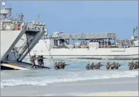  ?? ANI ?? The integral combat platforms and forces of the Andaman and Nicobar Command (ANC) during a Joint Services Operationa­l Demonstrat­ion at Radhanagar beach, Swaraj Dweep on Sunday. President Ram Nath Kovind attended the demonstrat­ion of multi-dimensiona­l operationa­l capabiliti­es of the command, the Indian Navy said in a statement.