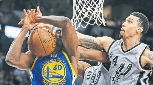  ?? RONALD CORTES/GETTY IMAGES FILE PHOTO ?? Now former Spurs Danny Green, right, and Kawhi Leonard, rear, made life difficult for Harrison Barnes and the Golden State Warriors in 2016.