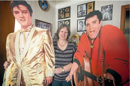 ?? PHOTO GRANT MATTHEW/STUFF ?? Donna Hardy has been collecting Elvis memorabili­a for nearly two decades and is selling some of it to make room for other pieces.