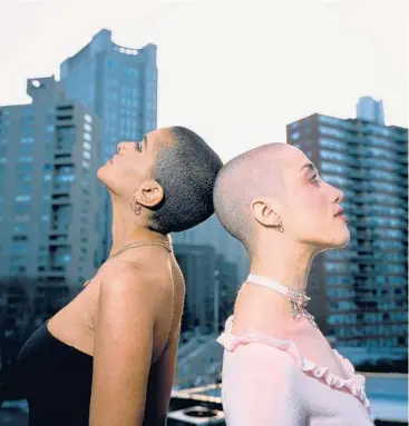  ?? OK MCCAUSLAND/THE NEW YORK TIMES ?? Rita Melssen, left, and Clara Perlmutter on March 18 in New York. There’s plenty of evidence that the shaved head is the first trendy cut of 2022.