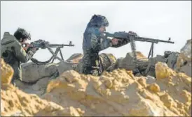  ?? AFP ?? Fighters with the Us-backed Syrian Democratic Forces take part in an operation to expel Islamic State militants in the Baghouz area of Deir Ezzor, Syria.