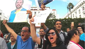  ?? — AFP photo ?? Protesters demonstrat­e against the jailing of ‘Hirak’ movement demonstrat­ors in Rabat.