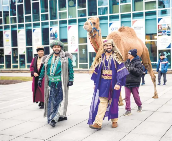  ?? MORNING CALLFILE PHOTO ?? The Three Kings, Nelson Matos, from left, William Cintron and Ramone Rodriguez, arrive at SteelStack­s with Einstein the camel, during the ArtsQuest celebratio­n of El Dia de los Reyes, Three Kings Day, in Bethlehem, Jan. 5, 2020. Three Kings Day is a cherished cultural and religious tradition in many Latin American countries.