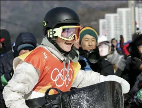  ?? LEE JIN-MAN — THE ASSOCIATED PRESS ?? Red Gerard, of the United States, smiles after winning gold during the men’s slopestyle final at Phoenix Snow Park at the 2018 Winter Olympics in Pyeongchan­g, South Korea on Sunday.