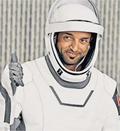  ?? ?? Out of this world Astronaut Sultan Alneyadi, from United Arab Emirates, gives a thumbs- up at the Kennedy Space Center in Florida before blasting off for the Internatio­nal Space Station.