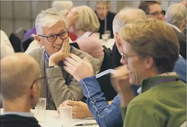  ??  ?? PRE COVID The Rev Neil Smart chatting at a church event held before the pandemic