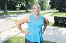  ?? NICK BRANCACCIO ?? Homeowner Denise St. Louis vividly remembers the devastatin­g flood of 2016 when Lacasse Boulevard, shown behind, was a flowing river leading to her home.