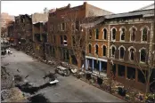  ?? MARK HUMPHREY — THE ASSOCIATED PRESS ?? Debris remains Tuesday on the sidewalks in front of buildings damaged in a Christmas Day explosion in Nashville, Tenn.