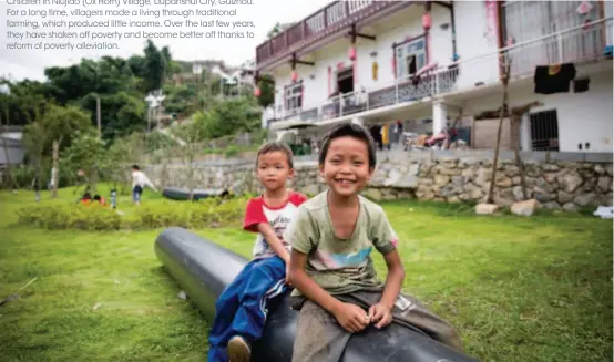  ??  ?? Children in Niujiao (Ox Horn) Village, Liupanshui City, Guizhou. For a long time, villagers made a living through traditiona­l farming, which produced little income. Over the last few years, they have shaken off poverty and become better off thanks to reform of poverty alleviatio­n.