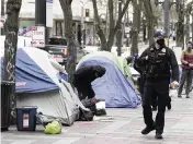  ?? ?? More cities are pushing strict measures to adress homelessne­ss that would have been unheard of a few years ago.