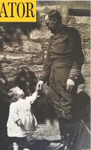  ?? HANDOUT / HEATHER CAMPBELL / THE CANADIAN PRESS ?? Lt.-Col. George Stephen Cantlie, who served with the Royal Highlander­s of Canada in the First World War,
is seen with his young daughter Celia. Dried flowers picked by Cantlie and others from the fields of war-torn Europe can be seen in an exhibition in Montreal until January, when it moves to Edmonton.