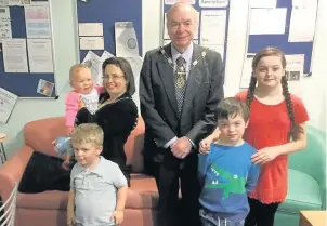  ?? Cllr Savage and Cllr Delaney with Elsie Carr, Theo Graham, and Dillon and Robynne Barnes, who have all been treated at the neo-natal unit ??