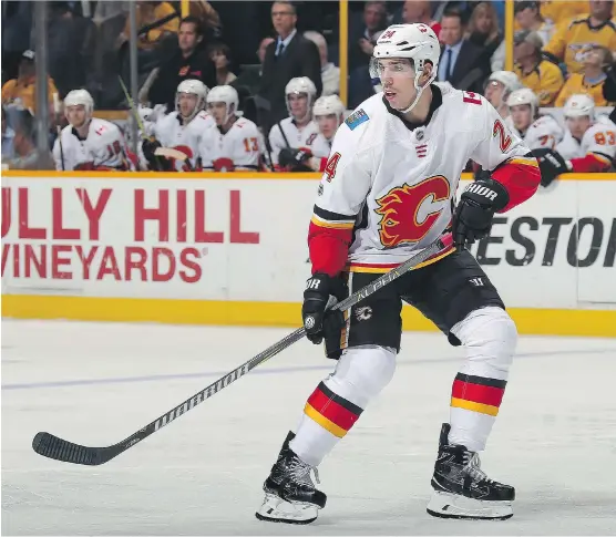  ?? FREDERICK BREEDON/GETTY IMAGES FILES ?? Calgary Flames defenceman Travis Hamonic has been out since Nov. 4 with a lower-body injury.