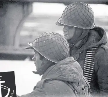  ?? ?? Argentine conscript soldiers in the Falkland Island’s capital Stanley during the occupation of the town. The picture was taken by Graham Bound and forms part of the new exhibition at the dockyard