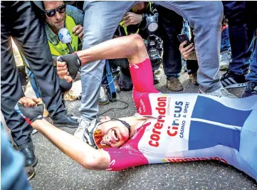  ??  ?? Mathieu van der Poel fell to the ground after winning the Amstel Gold. - AFP photo