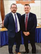  ?? Contribute­d photo ?? The Shelton Board of Education has approved the hiring of Donato Piselli as principal of Perry Hill School. Piselli, left, stands with Shelton Superinten­dent Ken Saranich.
