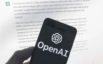  ?? ?? The OpenAI logo is seen on a mobile phone in front of a computer screen displaying output from ChatGPT. Picture: AP