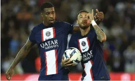  ?? Photograph: Aurélien Morissard/AP ?? Neymar celebrates with Presnel Kimpembe after equalising from the penalty spot at Parc des Princes.