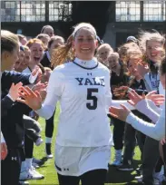  ?? Yale University Athletics ?? Izzy Nixon is coming off a junior season for the Yale lacrosse team that saw her break the Ivy League single-season record for draw controls. She also earned All-Region honors and was an All-Ivy League selection.