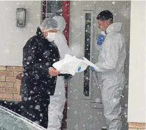  ?? Picture: Gareth Jennings. ?? Police and forensics officers at the scene of the incident on South Road, Dundee.
