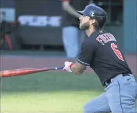  ?? TONY DEJAK — THE ASSOCIATED PRESS ?? Cleveland Indians’ Mike Freeman watches his two-run home run during an intrasquad game Monday. Will the team change its name now that the Washington Redskins have?