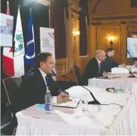  ?? ADRIAN WYLD / THE CANADIAN PRESS FILES ?? Assembly of First Nations Chief Perry Bellegarde, left, Justice Minister David Lametti and President of the Inuit Tapiriit Kanatami Natan Obed at an announceme­nt
about UNDRIP last month in Ottawa.